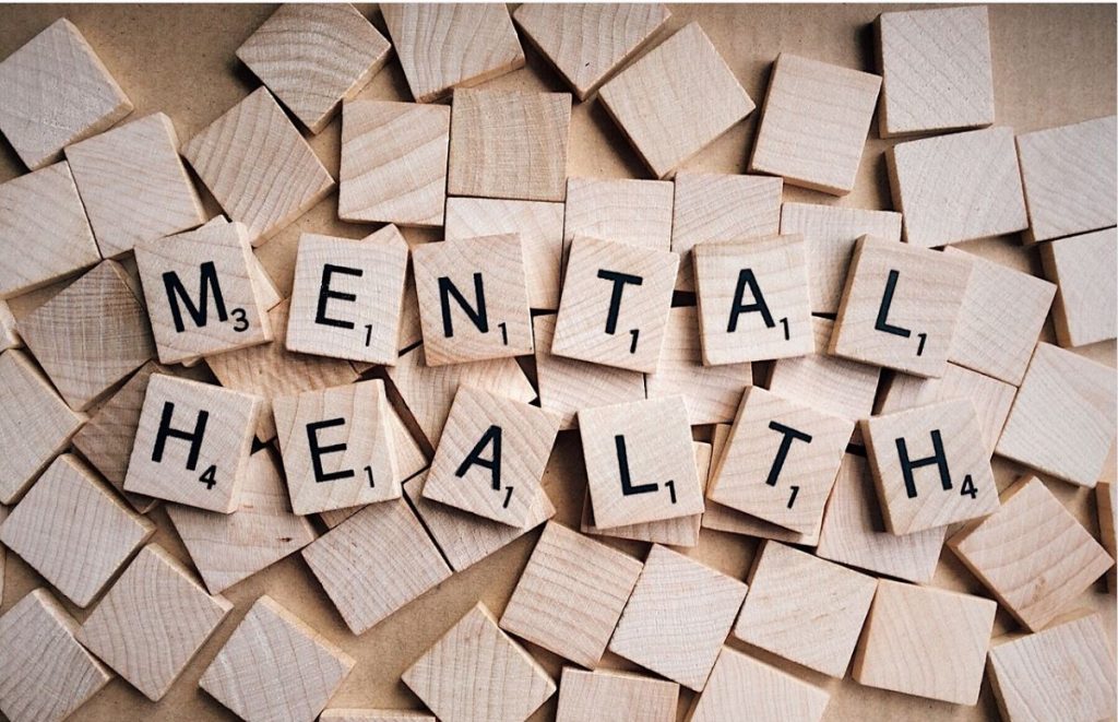 scrabble tiles spelling words mental and health
